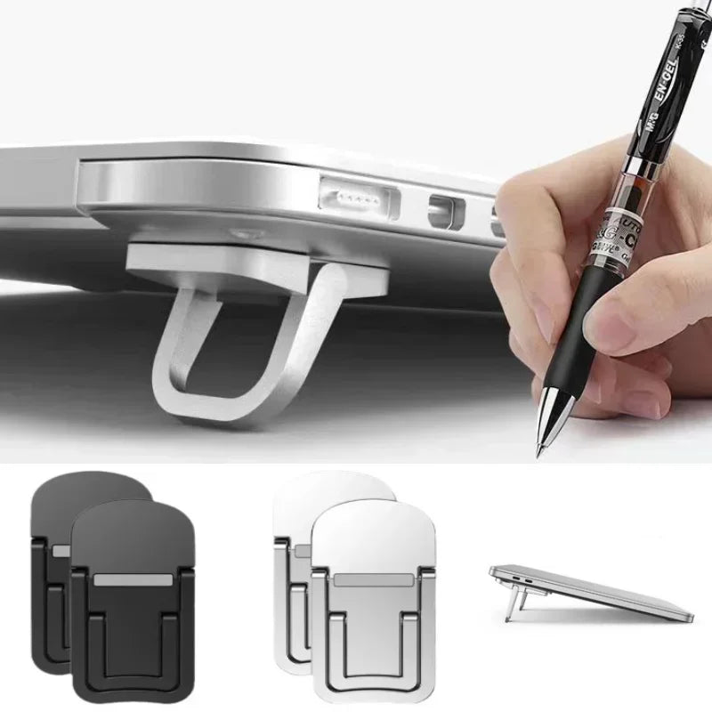 Foldable metal laptop stands in black and silver, shown in use elevating a laptop for typing.