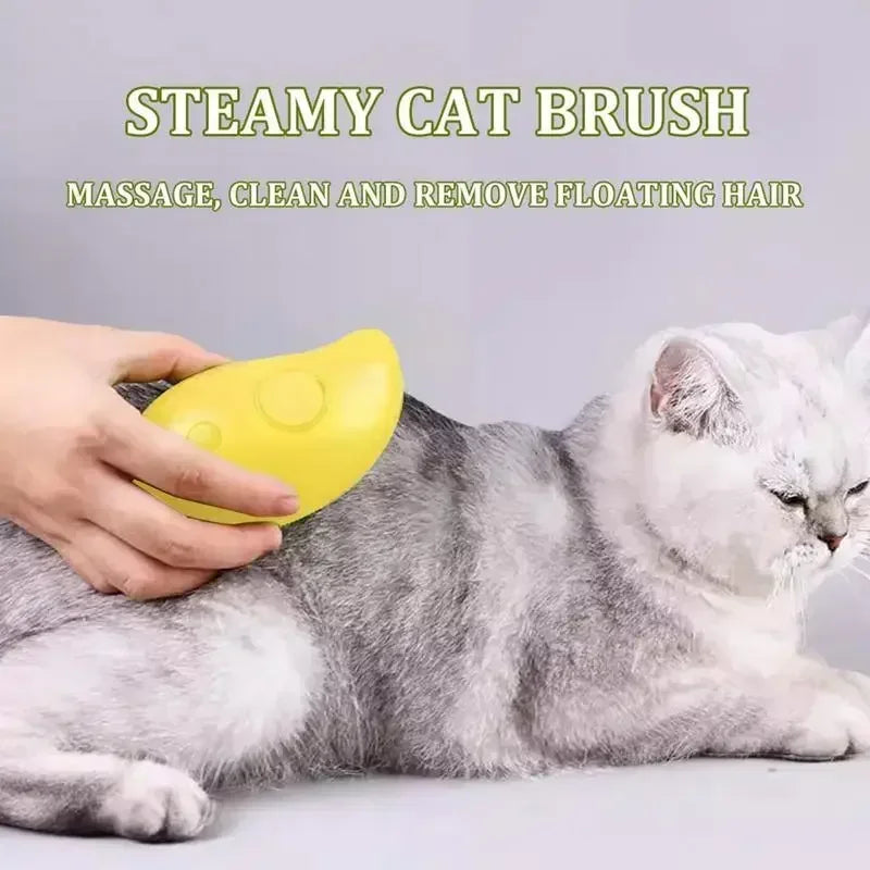 Person using yellow steamy cat brush to groom and massage a gray and white cat
