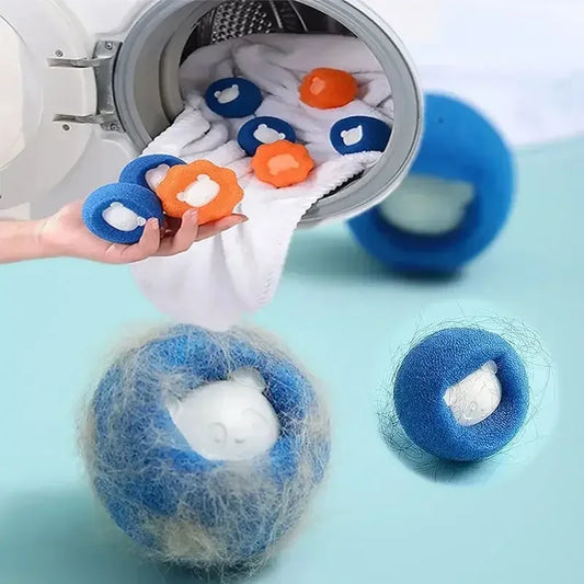Pet hair remover laundry balls in blue and orange catching hair in washing machine